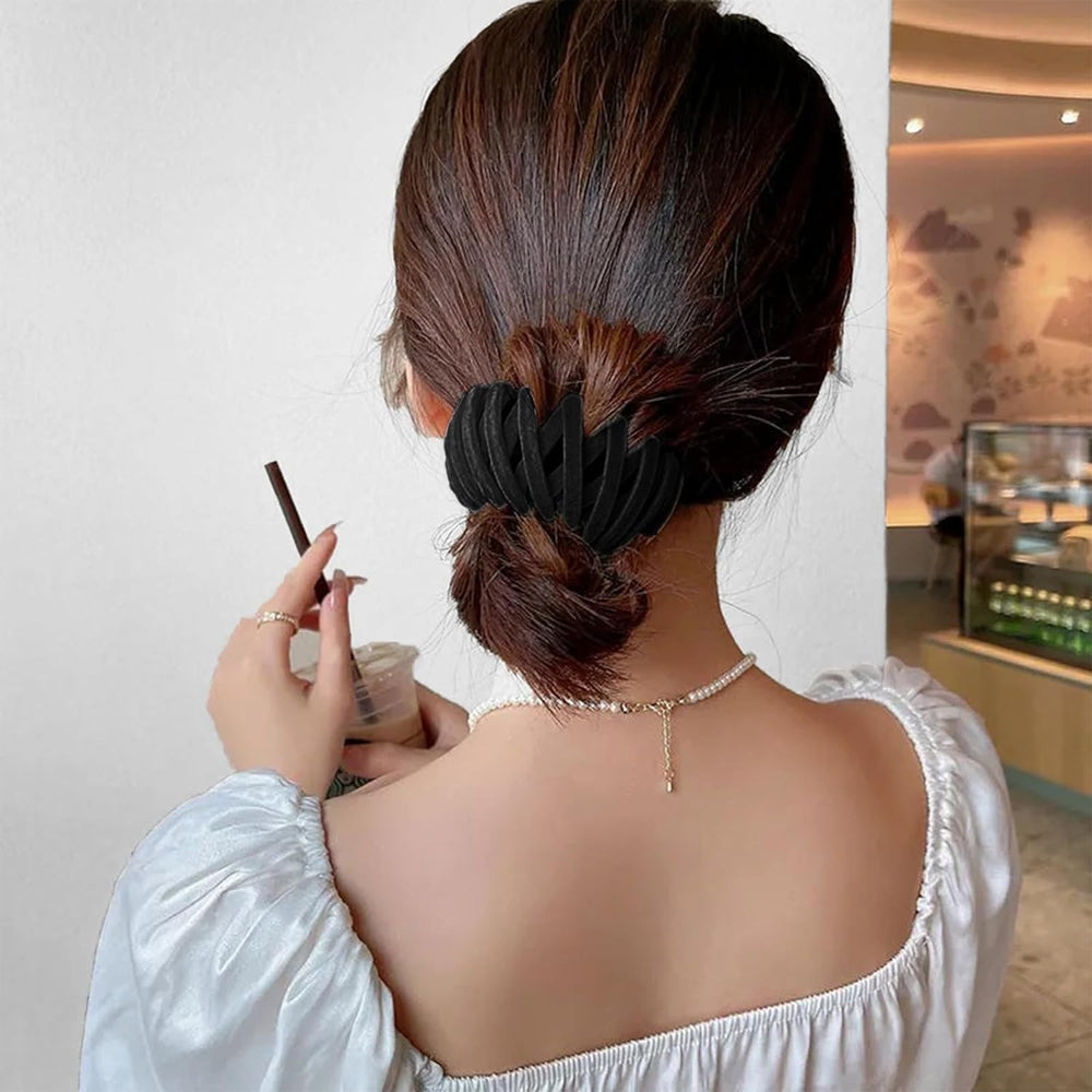 Aweoisa clip next to hand to show compact travel-friendly size