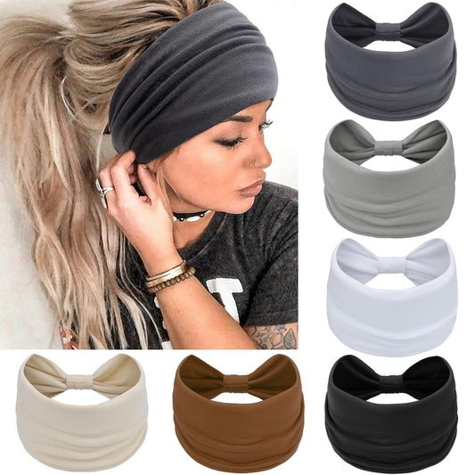 Awumbuk front view wide knotted headband shows secure fit and style