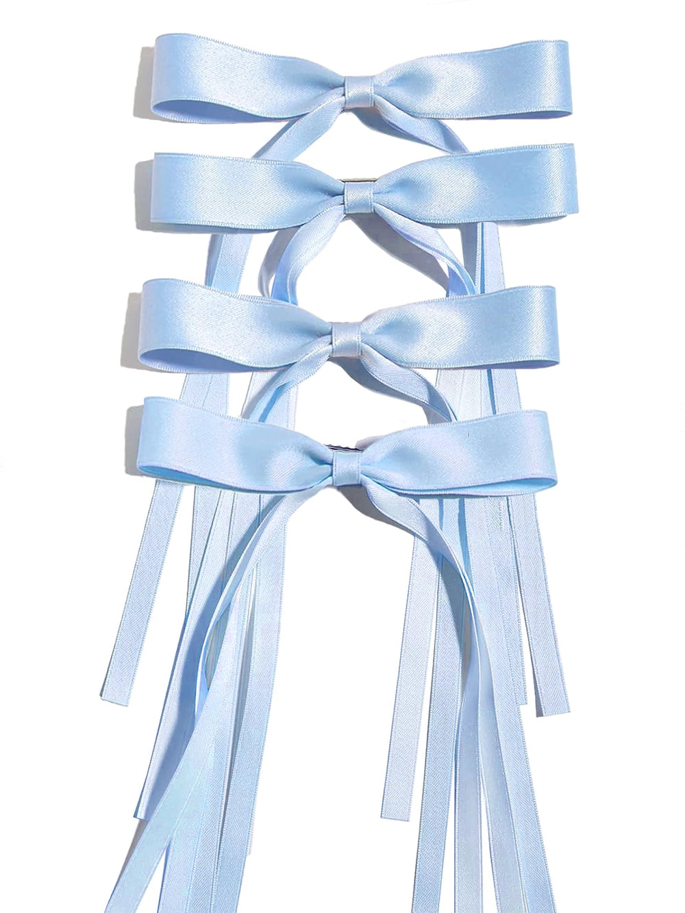 Ayesha blue bow front view showing neat ribbon and clip, adds instant style