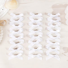 Ayesha assortment of bows laid out with label, ready for gifting