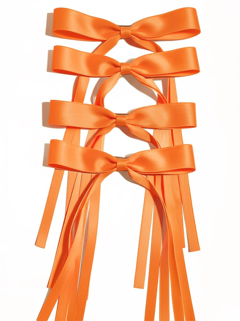 Ayesha orange bows front view showing four clips and bright color, ideal for styling