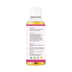 AYURVEDASHREE hair oil being massaged into scalp with warm towel for deeper absorption