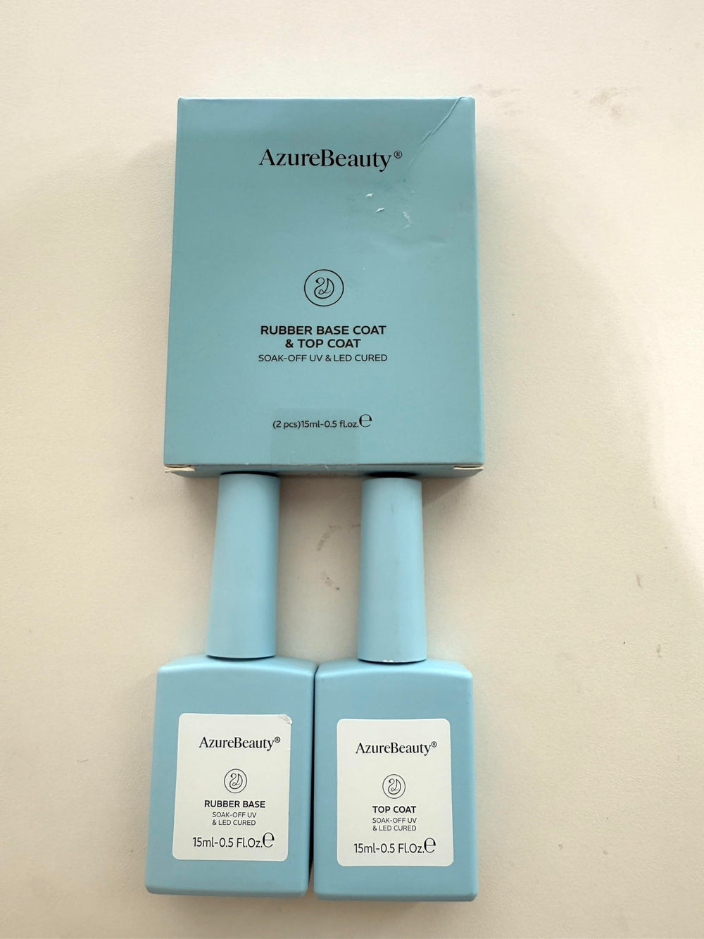 AZUREBEAUTY finished glossy nails lifestyle shot showing mirror shine