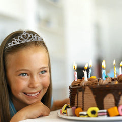 Baaxxango tiara in hand showing size and lightweight comfort advantage