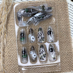 BABALAL nails displayed in hand to show scale and easy wearable length