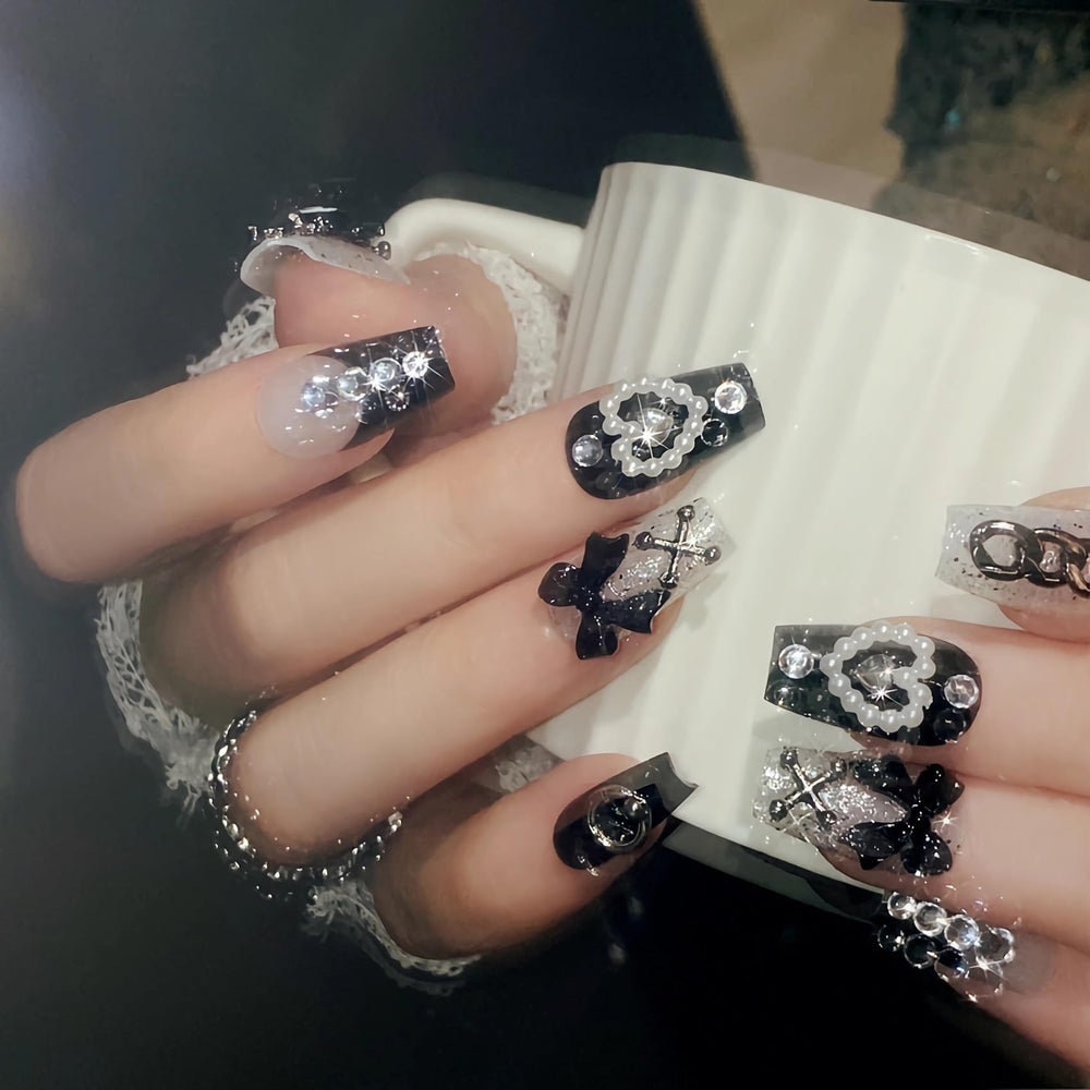 BABALAL detailed single nail showing gloss finish and French tip precision