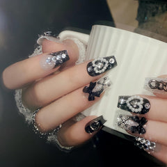 BABALAL detailed single nail showing gloss finish and French tip precision