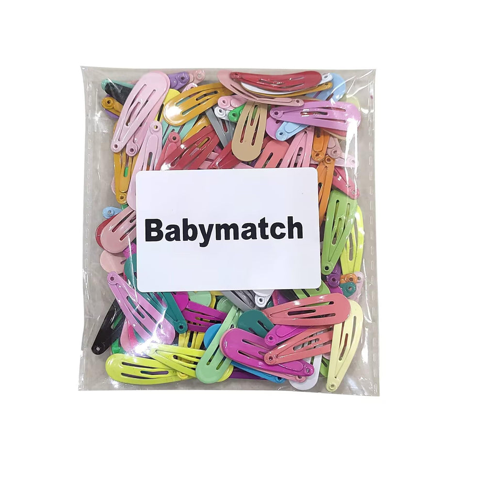 Babymatch party favors styling setup with clips for events and photo-ready looks