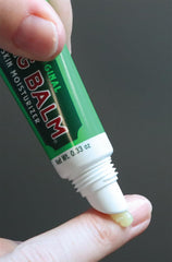 Bag Balm on fingertip showing texture and precise application for fast relief