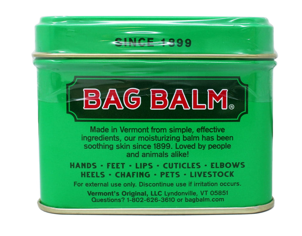 Application of Bag Balm to a pet's dry patch for soothing and protection