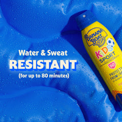 Banana Boat bottle near pool illustrating 80-minute water resistance