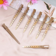 Bantoye clips in salon use holding sections for precise styling and coloring