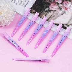 Bantoye clips lined up displaying gradient pink finish for easy selection