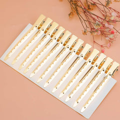 Bantoye clip in stylist hands sectioning hair quickly and neatly