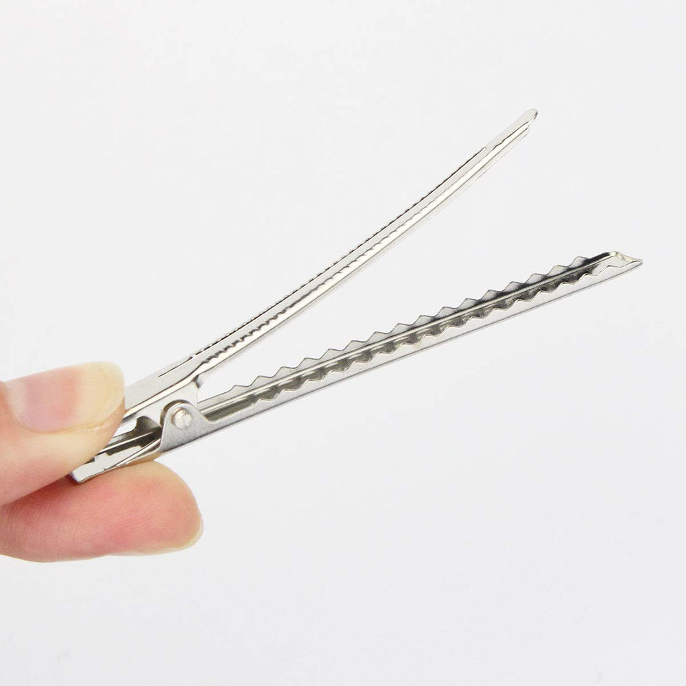 Bantoye clips next to ruler showing 3-inch length for sectioning efficiency benefit