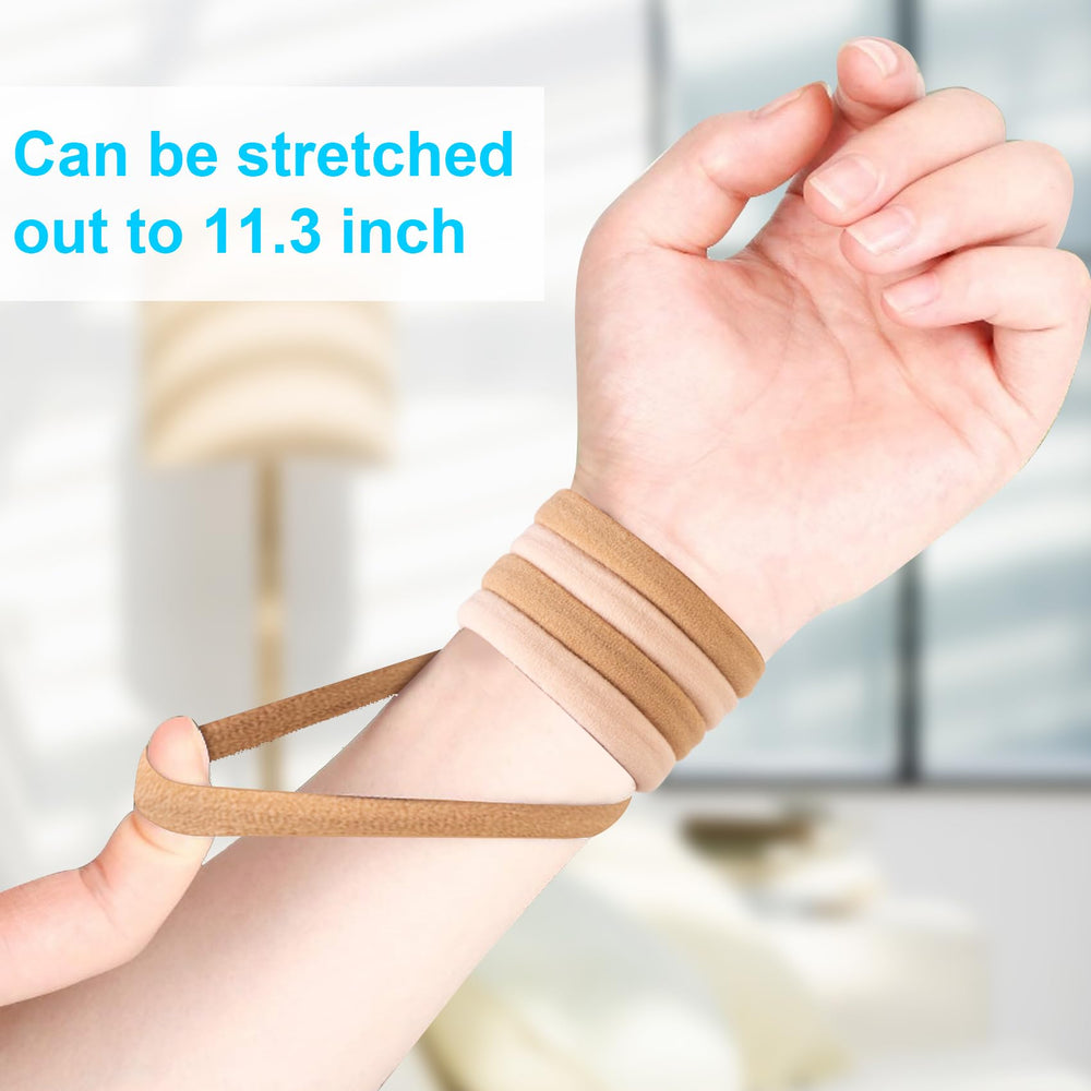 BAOLI hair ties next to a hand for scale showing large 2-inch diameter usability