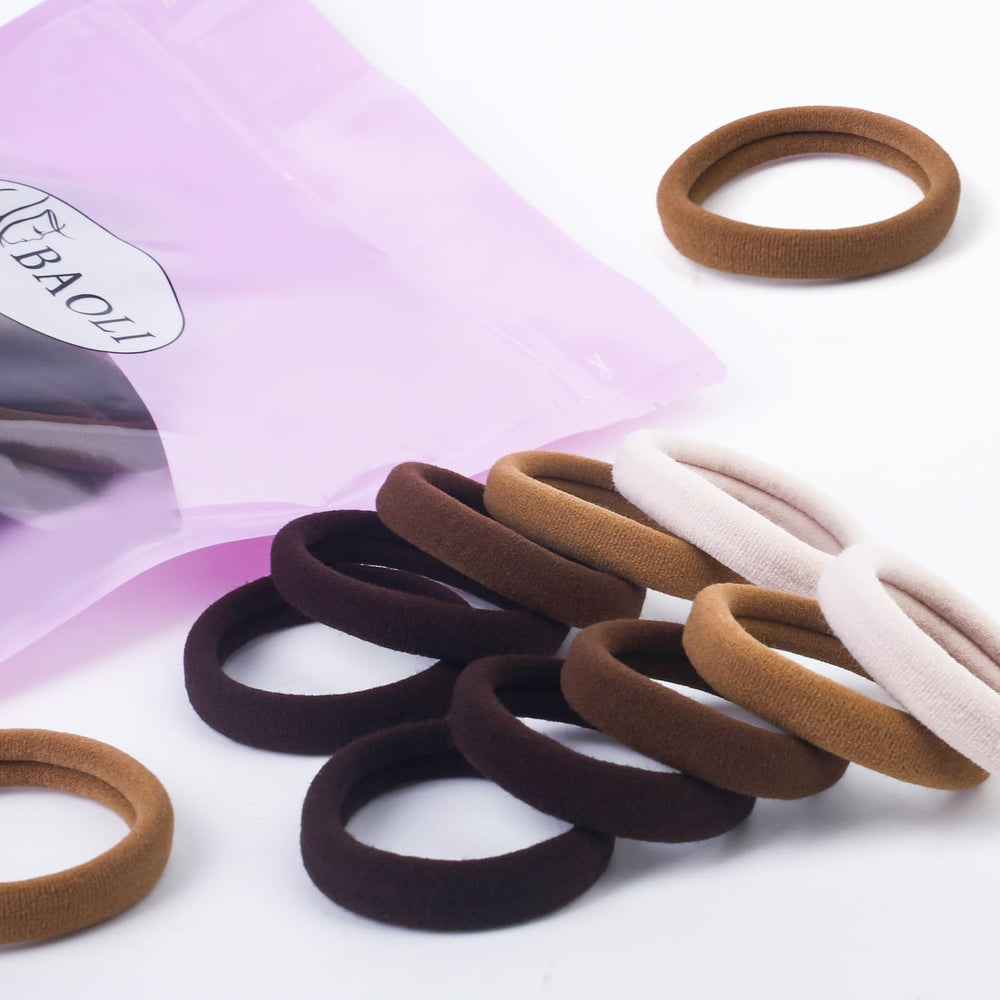 BAOLI hair tie next to a ruler showing 2-inch diameter for scale and reliable fit benefit