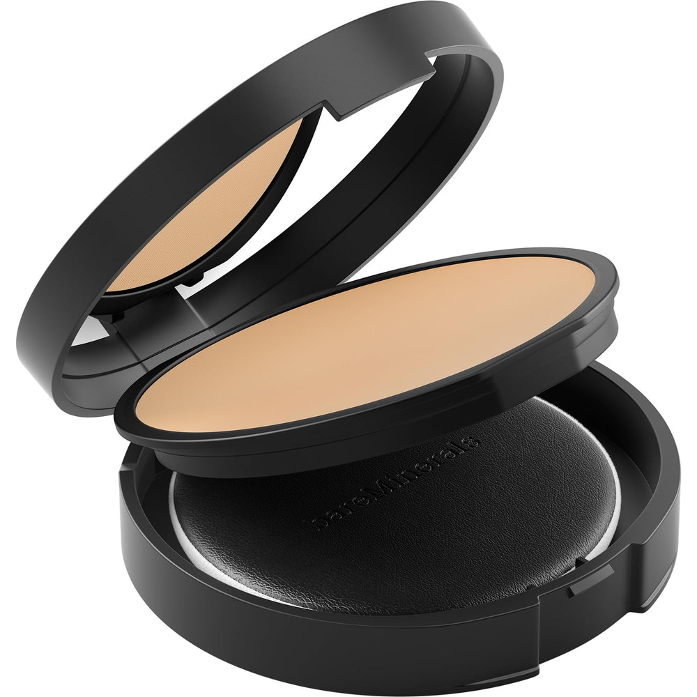 bareMinerals powder applied with brush to face, illustrating even, natural-looking setting