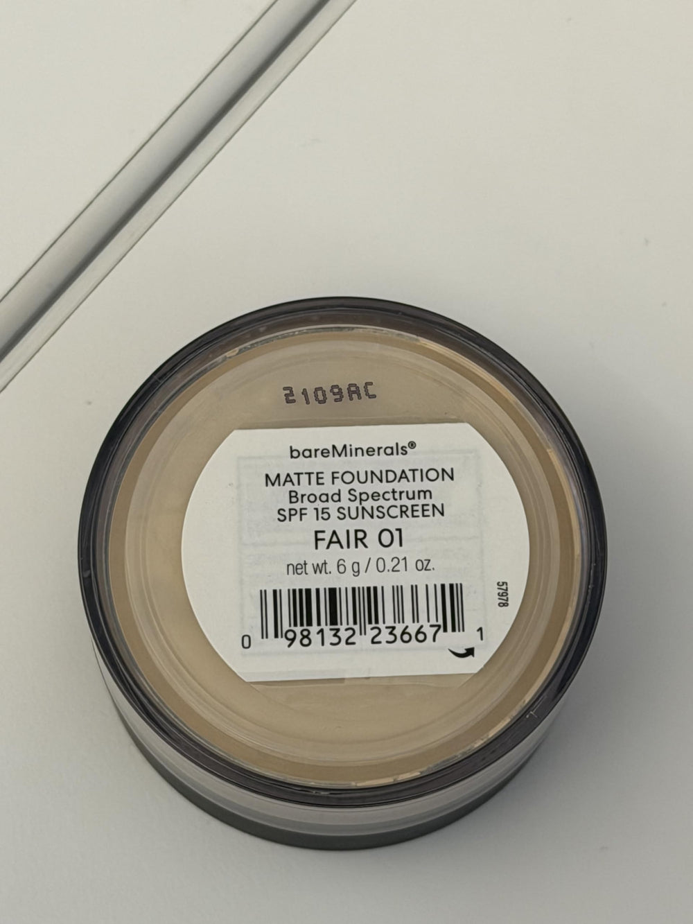bareMinerals travel and full packaging illustrating portability