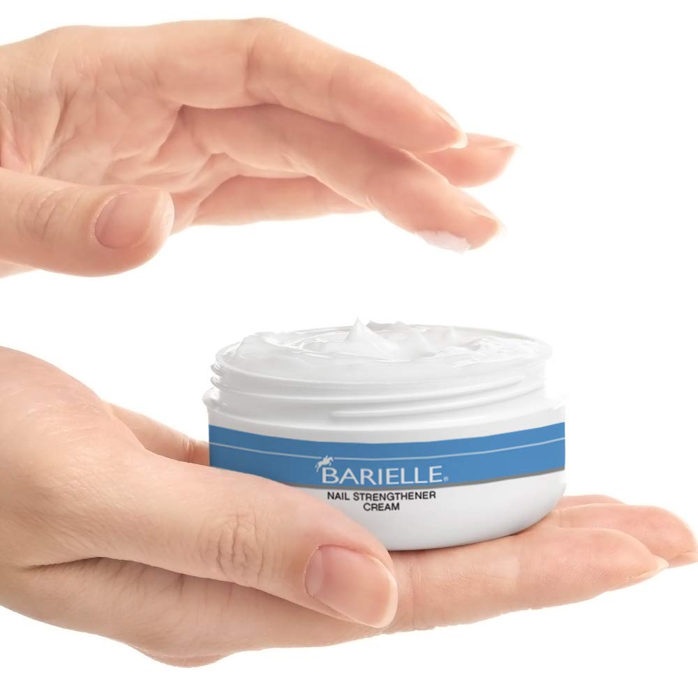 Barielle cream being applied to nail and cuticle for stronger, smoother nails