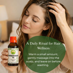 Pouring Basic Ayurveda oil beside shampoo showing pre-wash treatment use