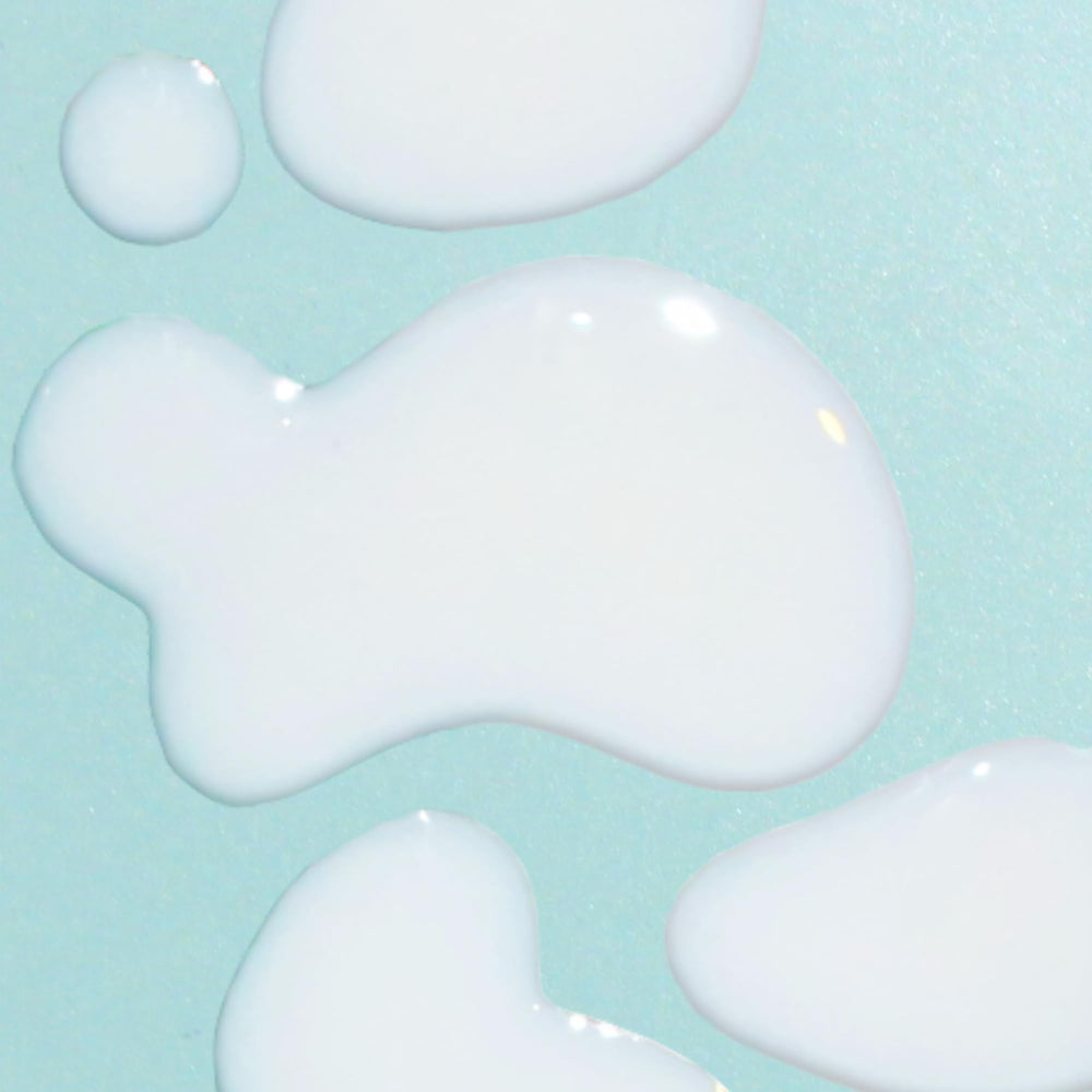 Bask serum spread on hand demonstrating quick absorption