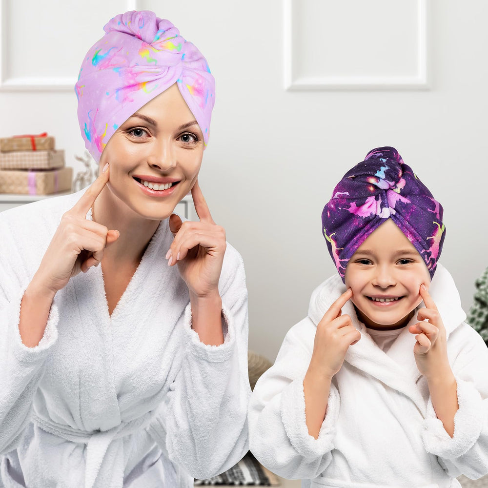 Basumee button and loop detail on turban that secures wrap for hands‑free drying