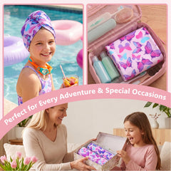 Child wearing Basumee pink butterfly turban smiling while hair dries and stays contained