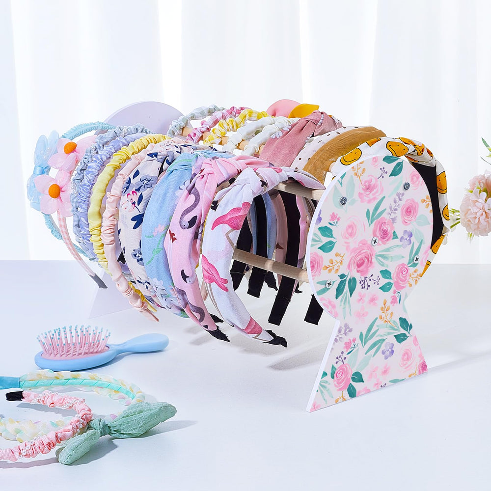 Basumee full assembled front view holding multiple headbands for quick selection