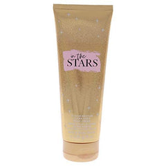 Person applying Bath & Body Works cream on arm showing smooth non-greasy finish