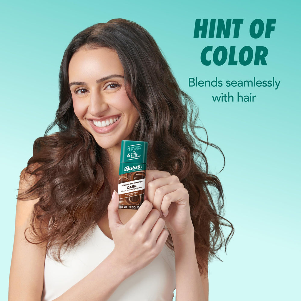 Batiste applied at dark hair roots reducing shine and restoring volume