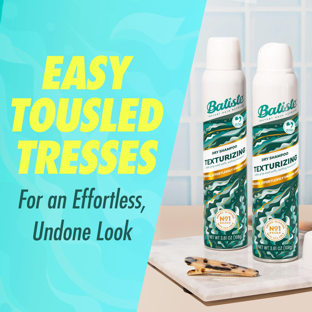 Batiste being sprayed at roots adding instant lift and grip to hair