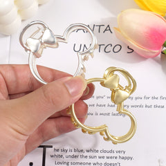 BBGifts clips styled at a party, adds playful accessory benefit