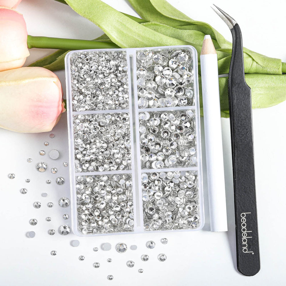 BEADSLAND close-up of mixed sizes SS6 to SS20 revealing precise glass cuts and sparkle