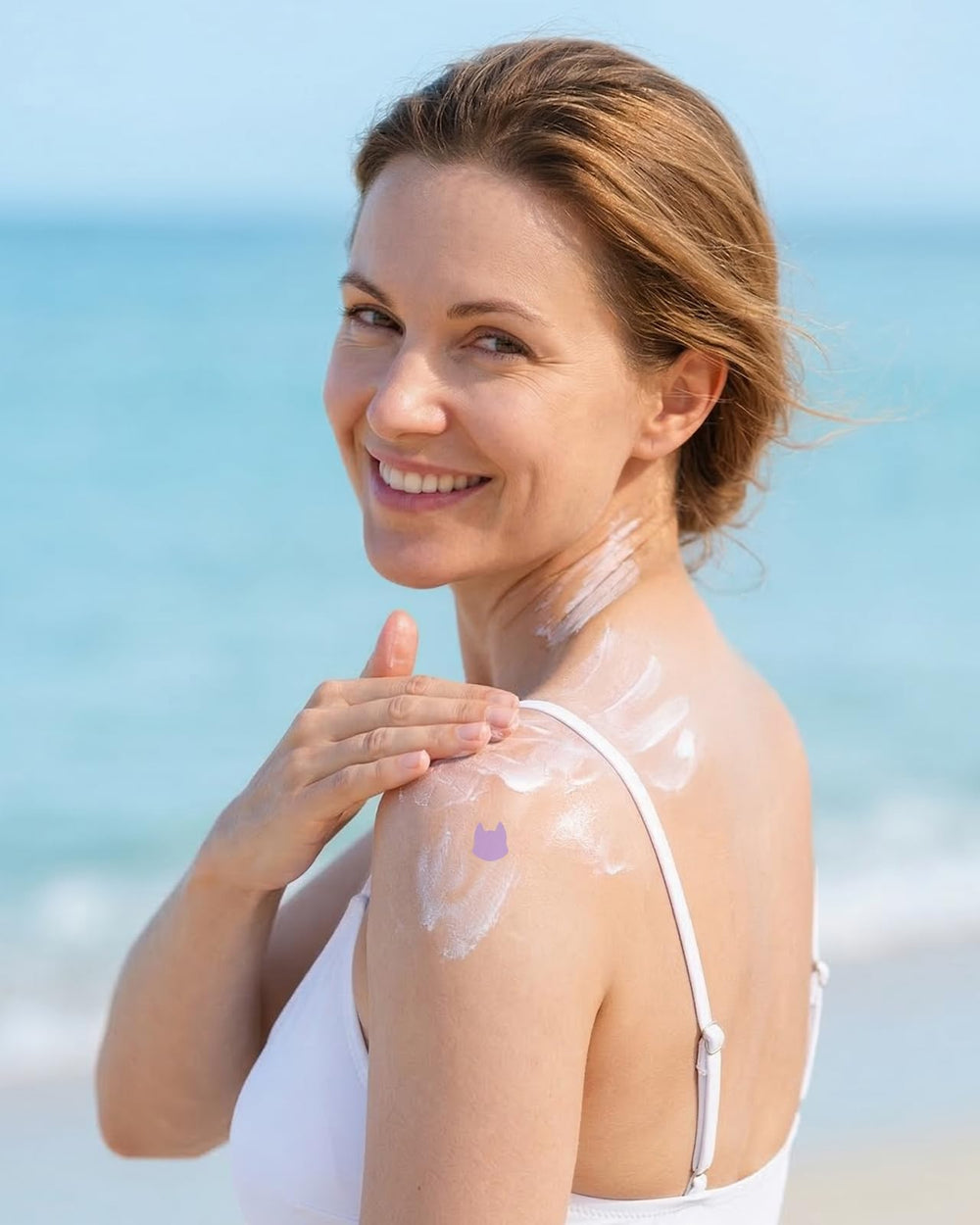 Beautistin stickers on children at beach illustrating family sun-safety