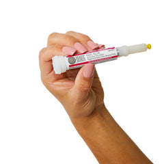 Beauty Secrets applying press on nail in use for quick secure manicure