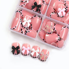 BEAWTH close-up of pink leopard French tip showing clear pattern and glossy finish