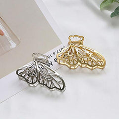 BeeGift clip securing a low bun showcasing polished finish and secure hold