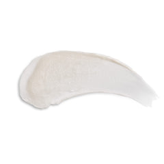 Beekman 1802 open tube texture displaying creamy balm for instant moisture