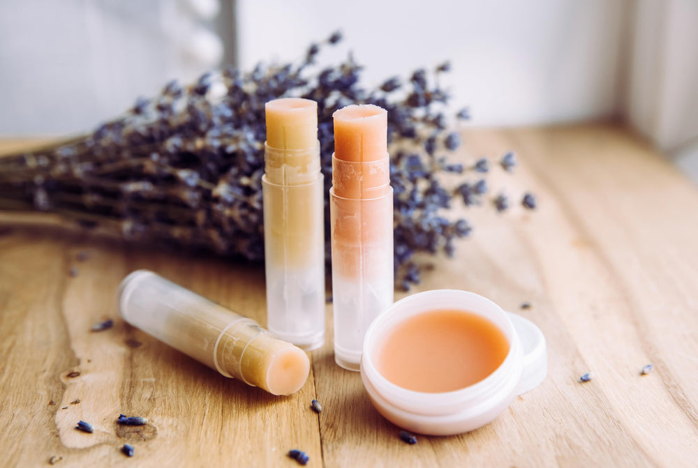BEESWORKS tube filled and being applied to lips, smooth application benefit