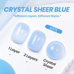 beetles brand model hands with manicured nails showing soft milky blue finish and shine
