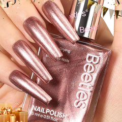 Beetles bottle front view showing champagne gold glitter polish and glossy benefit