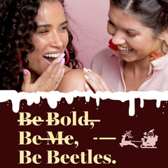 beetles cured manicure lifestyle photo showing glossy holiday nails