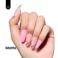 Beetles Gel Polish Flamingo Feather applied on hands in lifestyle scene for polished look