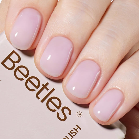 Beetles bottle front view showing nude purple jelly and compact 15ml size benefit of portability