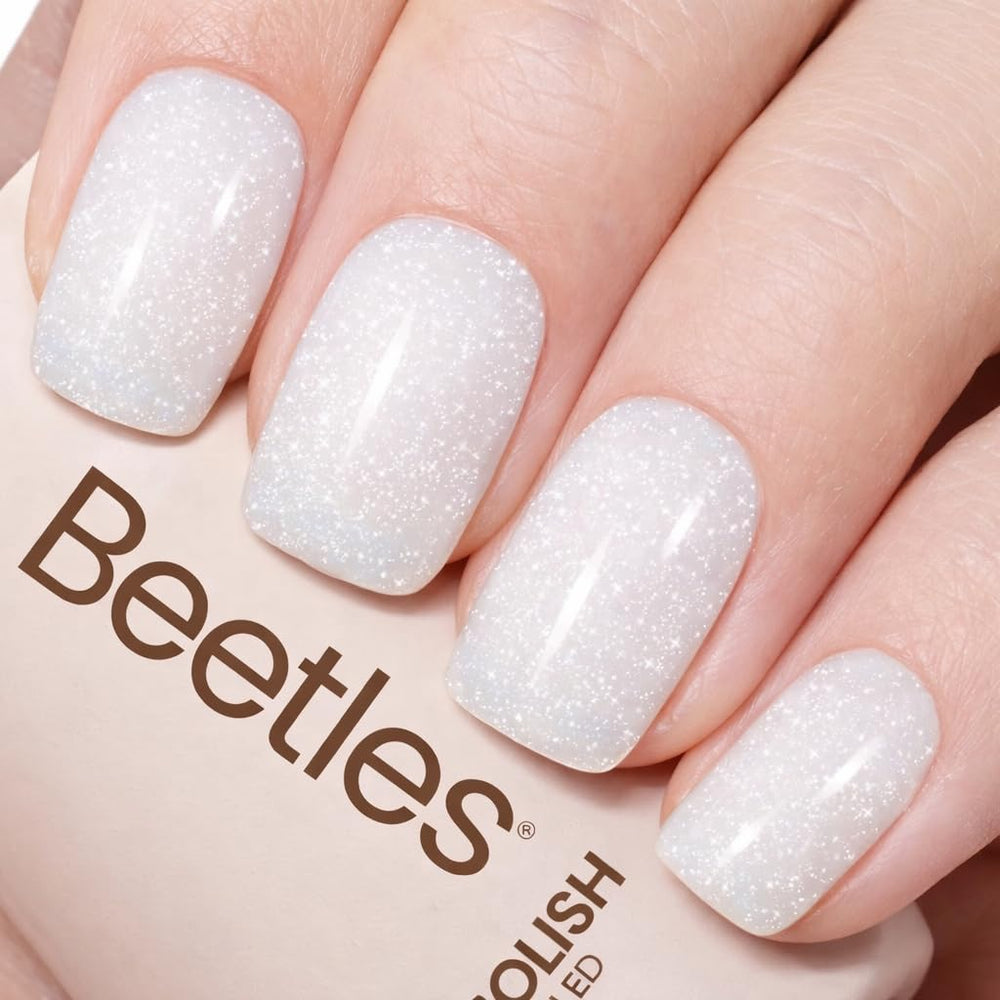Beetles bottle front view showing milky white shimmer and brand benefit of glossy finish