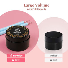 beetles nail glue with rhinestone being placed showing precise application benefit