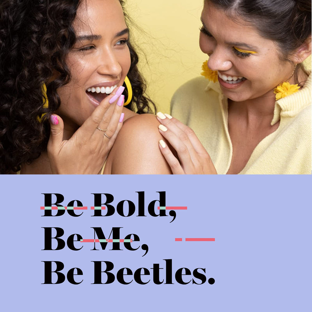 beetles Gel Polish finished nails in lifestyle scene highlighting elegant long-wear finish