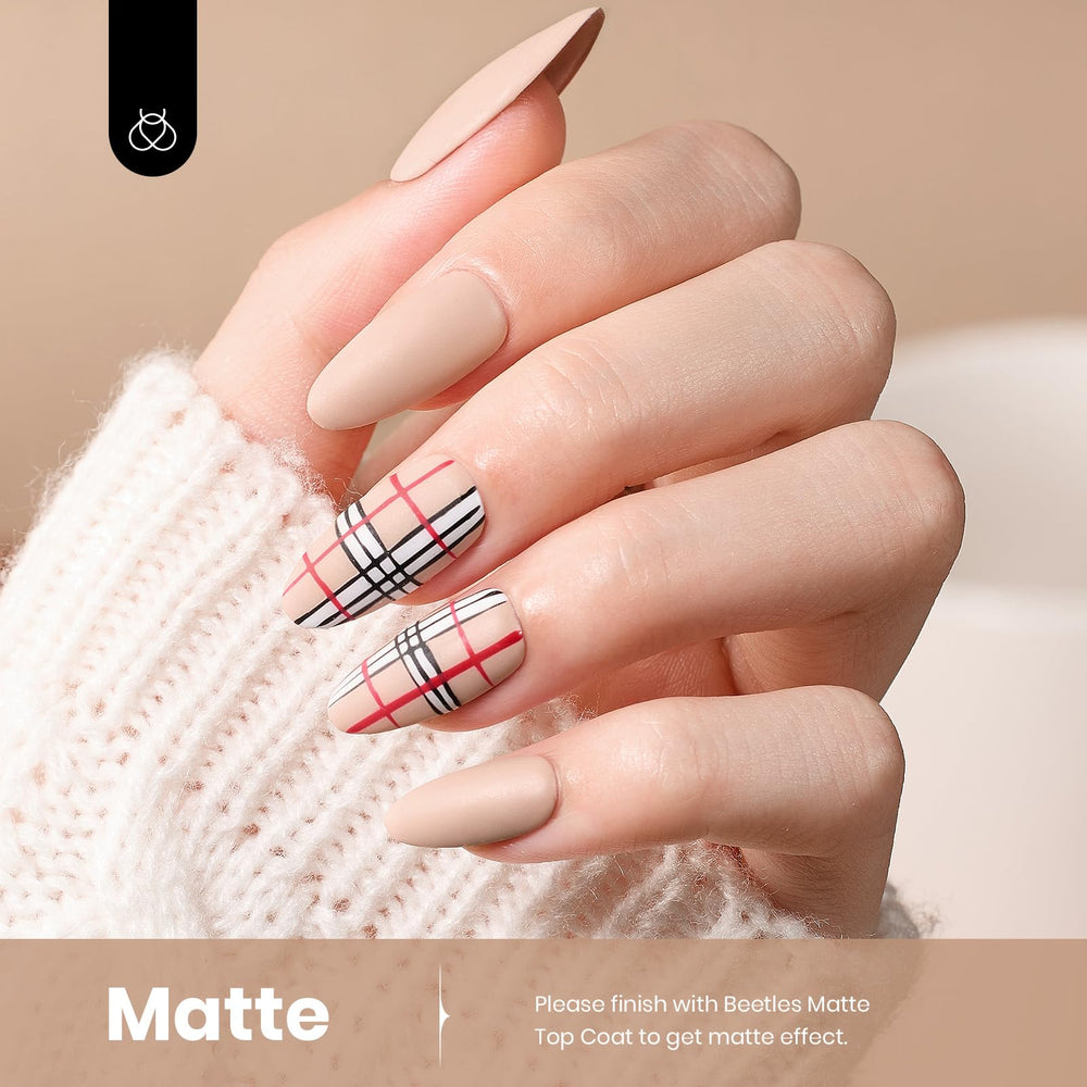 hand model with Beetles nude polish on nails showing wearable color benefit polished look