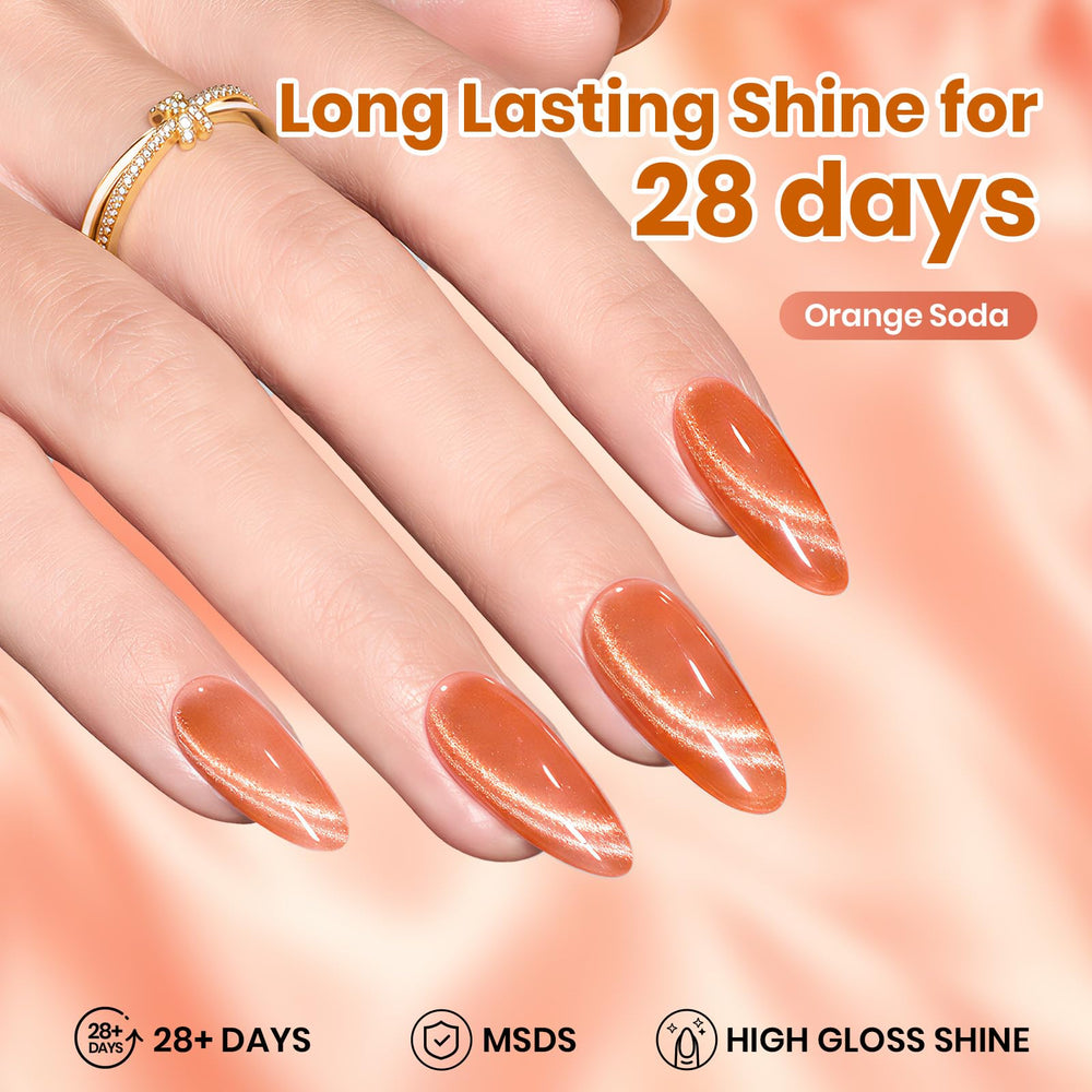 beetles swatch on fingernail displaying vivid orange and golden shimmer